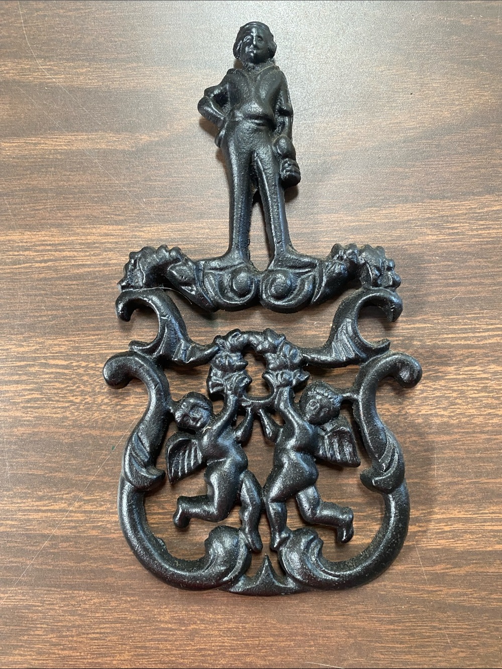 Vintage J.Z.H. T-11 1955 Black Cast Iron Trivet  Cupid Cherubs and Gentleman USA